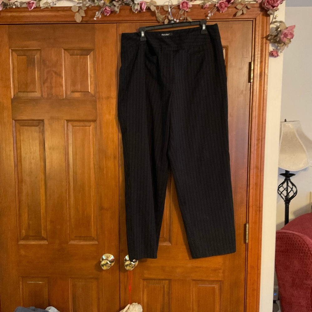 Black women’s slacks, black w/green pinstripes, size16W, good condition.